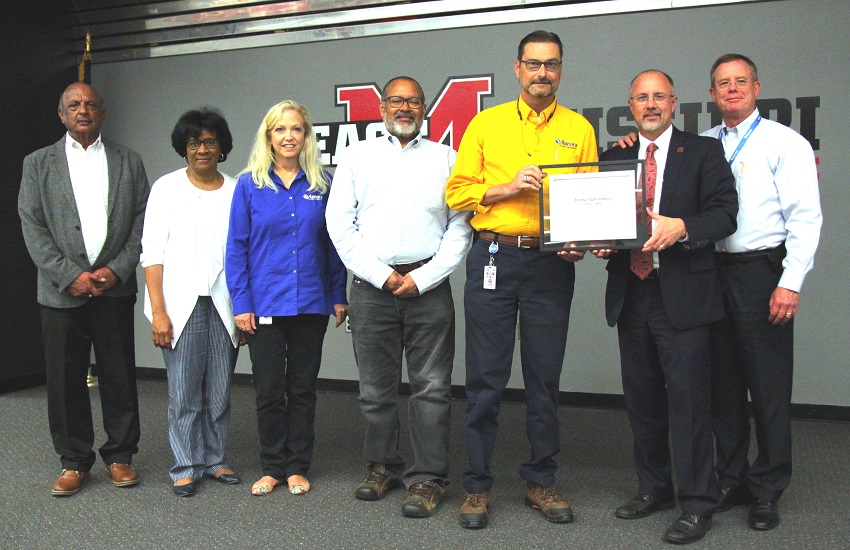 Aurora Flight Sciences received the Director’s Award at East Mississippi Community College’s 29th Annual Industry Appreciation Luncheon Wednesday, May 2, in the Lyceum Auditorium on the Golden Triangle campus. Here, EMCC President Dr. Thomas Huebner, second from right, presents the award. Aurora Flight Sciences received the Director’s Award at East Mississippi Community College’s 29th Annual Industry Appreciation Luncheon Wednesday, May 2, in the Lyceum Auditorium on the Golden Triangle campus. Here, EMCC President Dr. Thomas Huebner, second from right, presents the award.